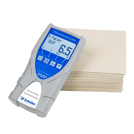 Schaller humimeter PMP z odczytem 6,5 % na tle ryzy papieru